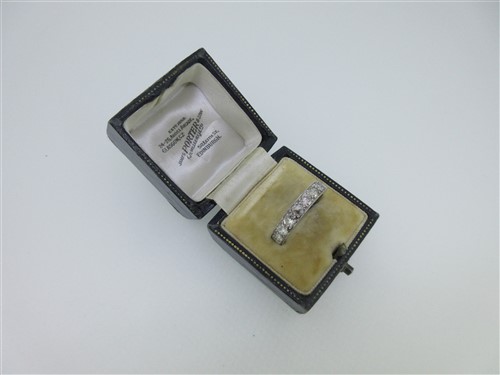 Lot 217 - A diamond full hoop eternity ring