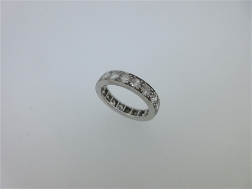 Lot 217 - A diamond full hoop eternity ring