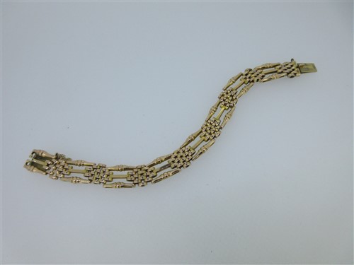 Lot 201 - A gatelink bracelet stamped '15c'