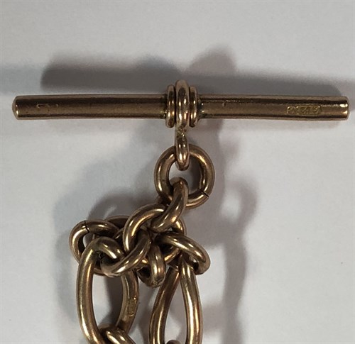 Lot 441 - An Edwardian 9ct rose gold double Albert watch chain