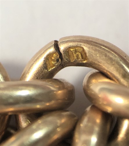 Lot 441 - An Edwardian 9ct rose gold double Albert watch chain