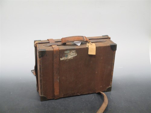 Lot 125 - A canvas and leather cartridge magazine