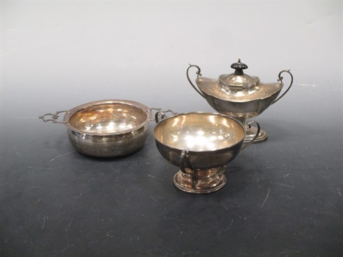 Lot 186 - A Georgian silver two handled bowl, together...