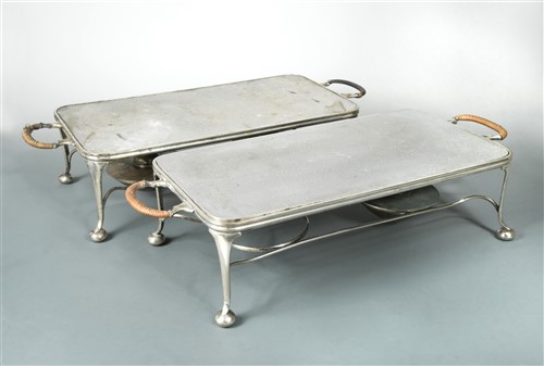 Lot 498 - Asprey - A pair of Edward VII silver plated hot plates