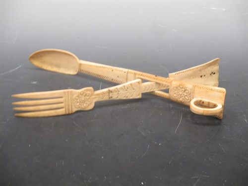Lot 98 - Nineteenth century carved bone tongs