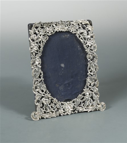 Lot 606 - A Victorian silver easel back photograph frame