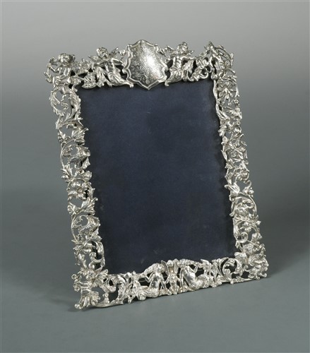 Lot 609 - A Victorian silver easel back photograph frame