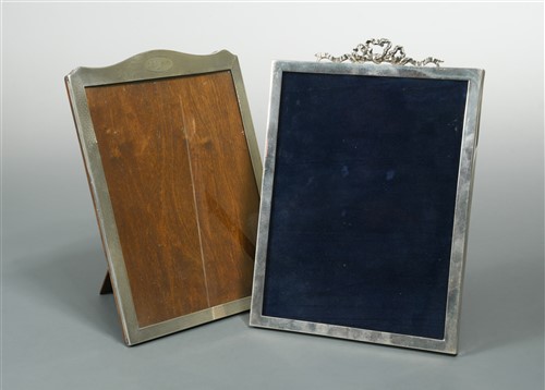 Lot 664 - Two George V silver easel back photograph frames