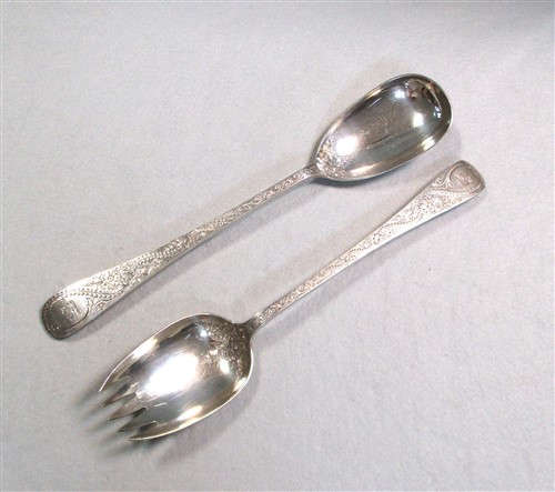 Lot 616 - A pair of Victorian silver salad servers
