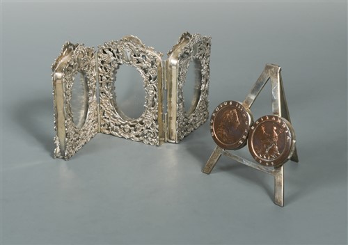 Lot 611 - Two Victorian silver novelty photograph frames