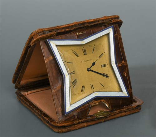 Lot 128 - Louis Vuitton, an Art Deco crocodile leather cased travelling clock