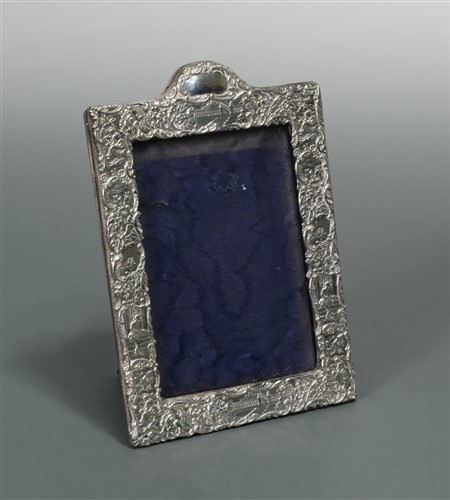 Lot 617 - A Victorian silver easel back photograph frame