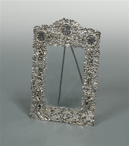Lot 531 - A Chinese export metalwares easel back photograph frame
