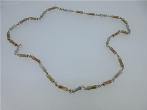 Lot 87 - A tri-coloured gold necklace by Mappin & Webb