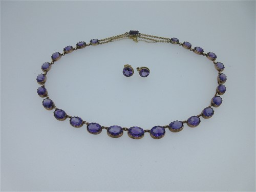 Lot 178 - A Victorian amethyst rivière necklace with matched amethyst earstuds