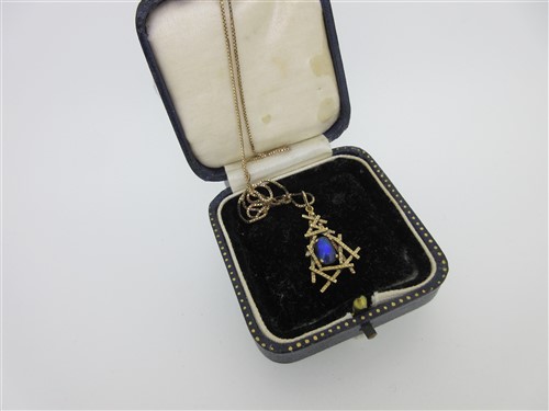 Lot 47 - A modern water opal pendant on box link chain