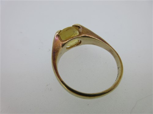 Lot 78 - A vintage paste set heart pendant, a citrine pendant and two other citrine or paste pieces
