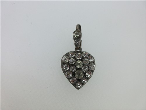 Lot 78 - A vintage paste set heart pendant, a citrine pendant and two other citrine or paste pieces
