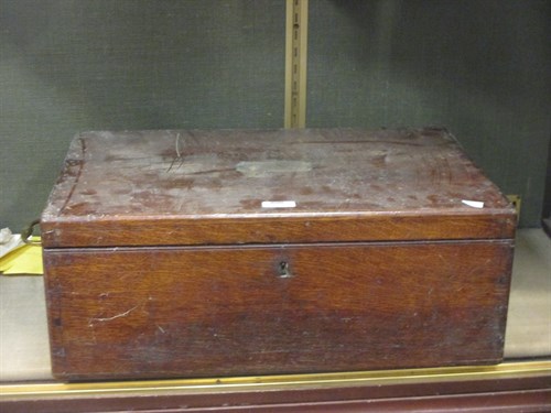 Lot 200 - A wooden canteen containing a quantity of...