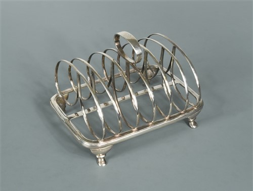 Lot 595 - A George IV silver toast rack