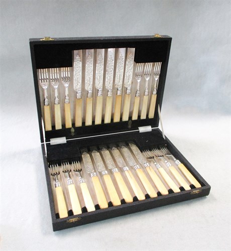 Lot 269 - A cased set of twelve pairs of Victorian silver fruit eaters