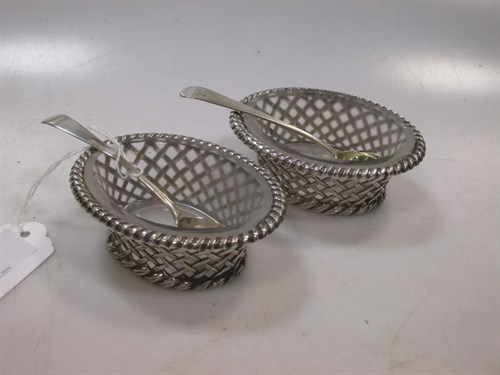 Lot 405 - A pair of Victorian silver oval shaped table...
