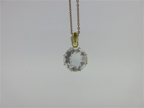 Lot 215 - A single stone sky blue topaz pendant on chain