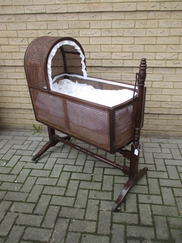 Lot 547 - A 19th century mahogany cradle on stand