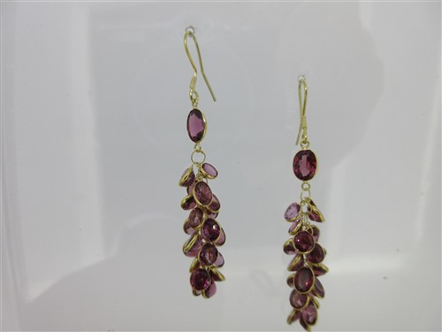 Lot 88 - A pair of waterfall earpendants set with garnets