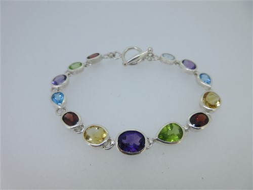 Lot 91 - A modern multi gem set bracelet