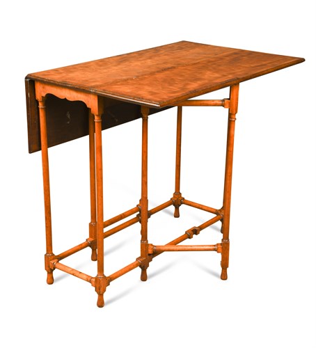 Lot 515 - A George III satinwood spider leg table
