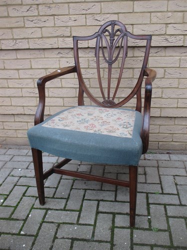 Lot 660 - A Hepplewhite mahogany open armchair, 103cm...
