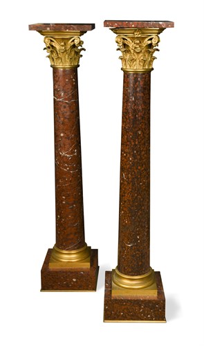 Lot 561 - A pair of 19th century ormolu mounted rouge marble columns