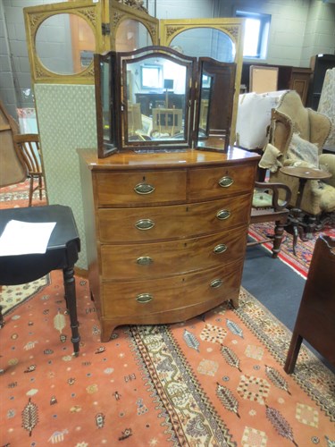Lot 394 - A 19th century mahogany bowfronted chest of...