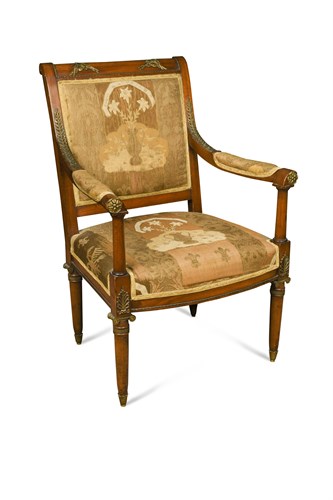 Lot 556 - An early 19th century mahogany salon armchair, possibly Russian