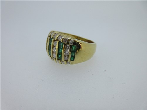 Lot 267 - A modern emerald and diamond ring signed by Cardow