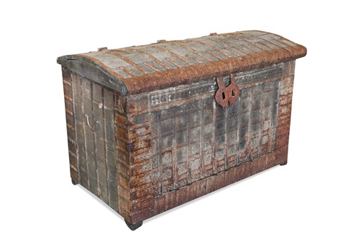 Lot 10 - An Indian teak and metal bound domed top trunk