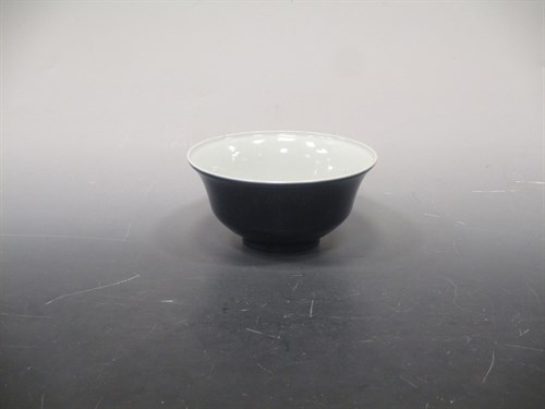 Lot 78 - A Chinese porcelain blue monochrome bowl, Qing...