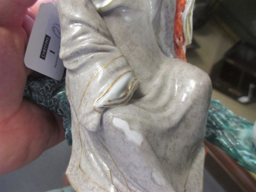 Lot 1 - Two Chinese porcelain figures of seated sages,...