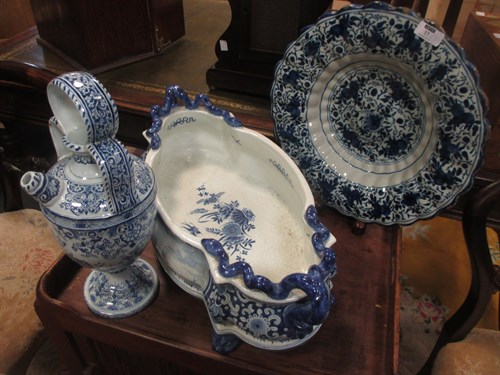 Lot 27 - An 18th century Dutch Delft fluted dish,...