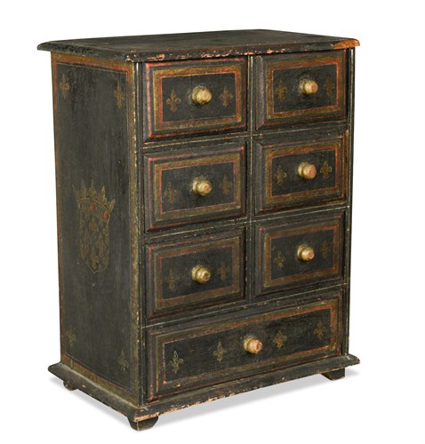 Lot 29 - A miniature painted chest of drawers