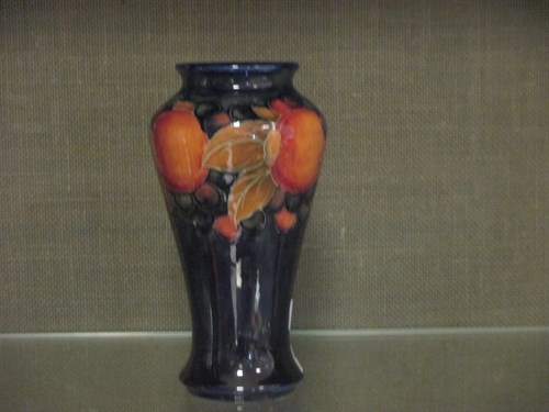 Lot 17 - A small Moorcroft vase decorated with...