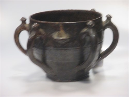 Lot 30 - An early earthenware multihandled vessel, 8in...