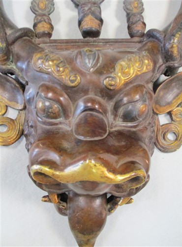 Lot 40 - A Tibetan bronze mask of Dharmapala Yamantaka