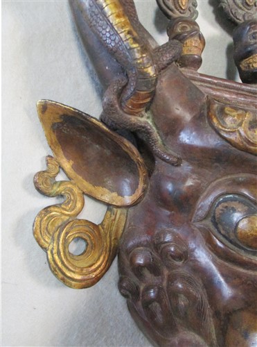 Lot 40 - A Tibetan bronze mask of Dharmapala Yamantaka