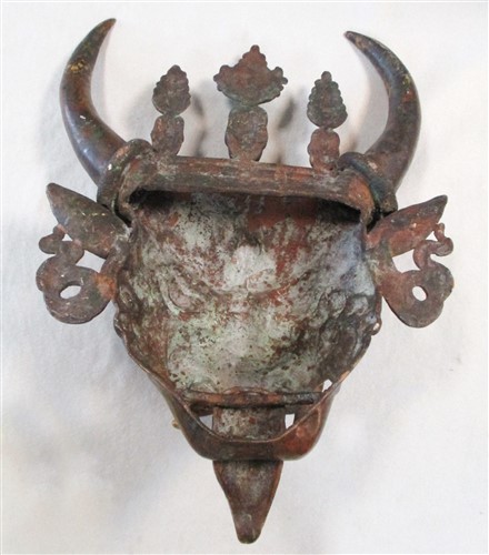Lot 40 - A Tibetan bronze mask of Dharmapala Yamantaka