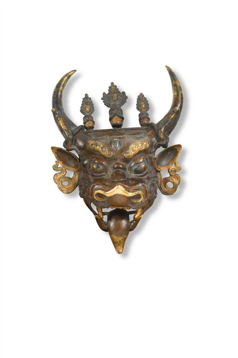 Lot 40 - A Tibetan bronze mask of Dharmapala Yamantaka
