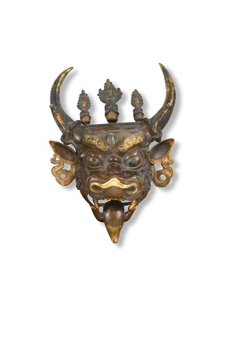 Lot 40 - A Tibetan bronze mask of Dharmapala Yamantaka