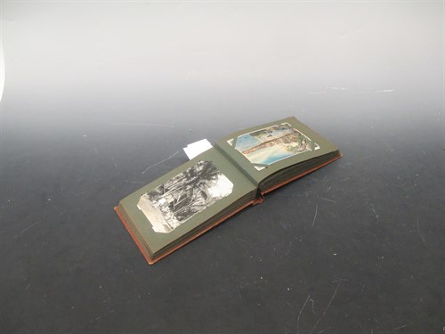 Lot 168 - Singapore & Penang interest, an album of approximately 59 real and printed photographic postcards