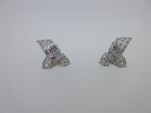 Lot 155 - A pair of mid 20th century diamond earclips